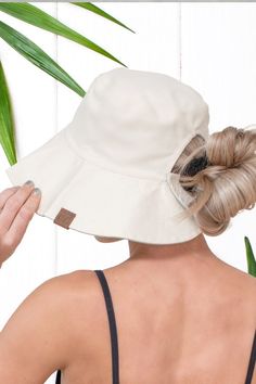 This adorable bucket hat is foldable and can be taken anywhere. It is reversible to give you a second color option which makes it even more versatile. Details: -It also blocks 98% UVA and UVB which would make it a great beach/pool hat. -The back has adjustable push tab sizing and a convenient opening for your ponytail or messy bun.Product Features:UVA/UVB Sun ProtectionGreat for any Outdoor Activity or Fashionable EventLightweight Durable MaterialFoldable for Easy TravelDistributed by a Family Owned USA Business- Made InternationallyTruly Contagious Support and Customer ServiceAuthentic CC Branding & QualitySizing:One Size Fits MostC.C (R) Tag || Fits Size Youth 5/6 - Adult || (Head Circumference 20" - 24")Shipping Details:Distributed by a Family Owned USA Business - Made InternationallyTr Pool Hat, Hat Ponytail, Usa Business, Jumper Denim, Holiday Graphic Tees, Holiday Leggings, Body Curves, Scarf Poncho, Online Clothing Boutiques