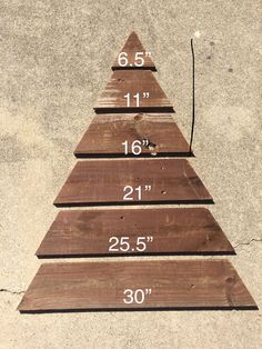 Took a couple of days but was well worth the time and imagination. Let me know what you think and ideas. Diy Seasonal Wood Projects, Shiplap Christmas Tree, Diy Wood Tree Decor, Log Display Ideas, Christmas Wood Crafts 2023, Christmas Trees Made Out Of Pallets, Pallet Christmas Tree Diy Measurements, Barn Wood Christmas Tree, Recycled Wood Crafts