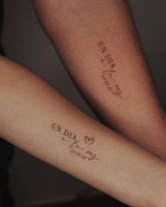 two people with tattoos on their arms that say, india and love are written in cursive writing