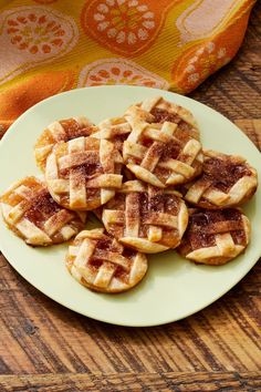 small waffles are arranged on a plate