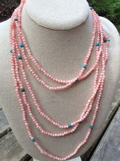 vintage pink beads necklace unique seed Beaded extra long flapper party 20s ITEM DESCRIPTION: Offering this beautiful, tiny pink seed beaded extra long necklace accented with a mix of turquoise/green/blue seed pearls. circa estimated 1960s-70s These tiny pearls have a quality weight; they could be glass or tiny stones. MEASUREMENTS: This dainty sweet necklace measures approximately 49 inches long (wearable length). This necklace can be knotted or wrapped (made into more than one strain) for a sh Pink Beads Necklace, Pink Decorations, Pink Bead Necklace, Flapper Party, 20s Style, Extra Long Necklace, Sweet Necklace, Long Beaded Necklace, Pink Jewelry