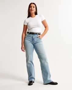 Our Curve Love high rise relaxed jeans in a medium wash, with front yoke detail and a clean hem. This fit features a 10.5” high rise, is fitted at the waist and hips, and eases at the thigh into a relaxed, full-length leg shape. Our Curve Love styles add an additional 2” at the hip and thigh to allow room for your curves and eliminate waist gap. This jean is made from our vintage stretch fabric which features both an authentic vintage look and contains slight built-in stretch for additional comf High Rise 90s Relaxed Jean, Female Features, Women's Bottoms, Relaxed Jeans, Denim Collection, Pocket Bag, Suits Coats, Athletic Fits, New Arrival Dress