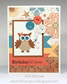 a birthday card with an owl holding a button