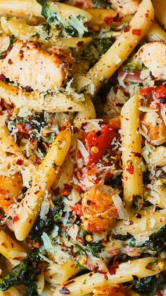 a white plate topped with pasta and chicken