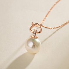 Material: 18K Rose Gold, Akoya pearl, and Diamonds Akoya saltwater cultured pearl Pearl size: 8.5-9.0mm Weight of diamonds: 3 diamonds, around 0.019ct in total Chain length: 45cm (adjustable 22.5cm) Handpicked of every pearl, only the top 1% of pearls are selected Handcrafted Lifetime warranty Handcrafted Elegant Round Pearl Necklace For Mother's Day, Elegant Pearl Drop Necklace For Mother's Day, Elegant Pearl Charm Necklace For Mother's Day, Pearl Necklace For Anniversary On Valentine's Day, Elegant Mother's Day Necklace With Pearl Charm, Elegant Mother's Day Pearl Charm Necklace, Pear-shaped Rose Gold Jewelry With Diamond Accents, Luxury Rose Gold Pearl Jewelry, Anniversary Rose Gold Necklace With Pearl Pendant