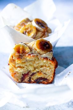 two pieces of cake sitting on top of white paper