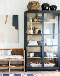 a living room filled with furniture and decor