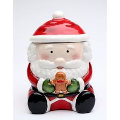 a santa claus cookie jar with a ginger in it's lap, on a white background