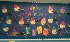 a happy new year bulletin board with scissors and hats