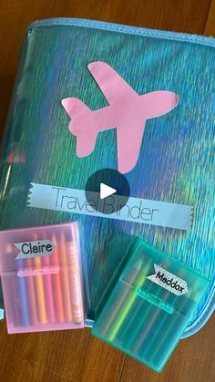 an image of a travel folder with markers and pencils