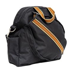 a black bag with gold stripes on the bottom and side zippers is sitting against a white background