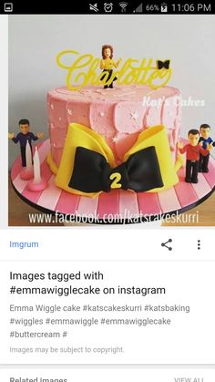 a pink cake with yellow and black bow on top is featured in an instagram