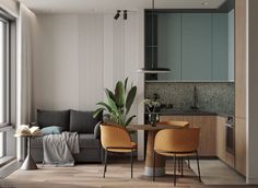 a living room filled with furniture and a dining table next to a window covered in curtains