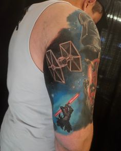 a man with a star wars tattoo on his arm