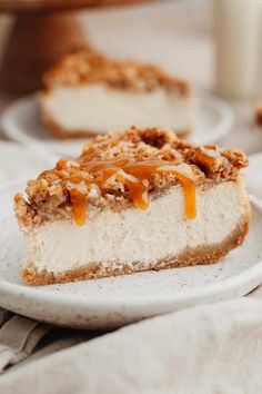 a piece of cheesecake on a white plate with caramel drizzle topping