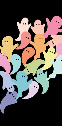 a bunch of ghost stickers are in the shape of small ghosts on a black background