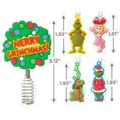 the grinch christmas ornament is hanging from a tree and has four different ornaments on it