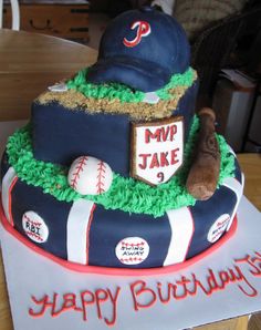 a baseball themed birthday cake on a table