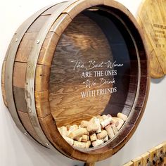 a wooden barrel with wine corks in it