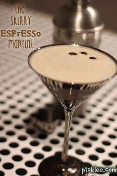 a martini with a smiley face on the rim