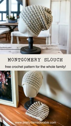 a knitted hat sitting on top of a wooden table next to a framed photo