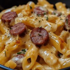 pasta with sausage and cheese in a bowl