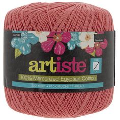 red yarn ball with flowers on the front and bottom, for artistee's mer