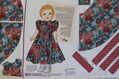 an image of a paper doll with flowers on it