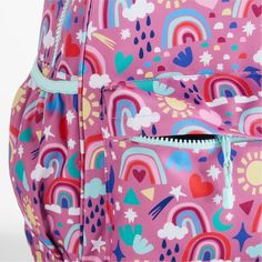 A backpack that's extra comfy and ready to handle daily adventures. A whimsical mix of raindrops, rainbows, stars and more shower the magenta exterior of our kids' large knapsack, and light aqua trim adds an extra burst of color. It's constructed of supremely durable polyester made from recycled water bottles and has a roomy interior to hold everything your kid needs—books, school supplies, extra layers. There's even a padded pocket to keep their tablet protected. Outside pockets hold snacks, wa Books School, Bottle Picture, Kids Bag, Monogram Backpack, Kids School Backpack, Girl Backpacks School, Kids' Bag, Kids Backpack, Clothes Pictures