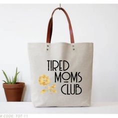 Tired Mom's Club By Fun Club Color: Cream Tote / Brown Handle Canvas Bag / Faux Leather Strap “Tired Mom's Club” Measures 15-In X 15-In X 4-In Funny Tote Bags, Tired Mom, Club Color, Weekender Tote Bag, Moms Club, Great Gifts For Mom, Perfect Gift For Mom, Leather Handles, Canvas Tote Bag