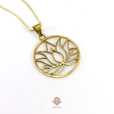 Lotus flower pendant. Product details This special lotus flower necklace. made with the highest quality brass. It is nickel-free and hypoallergenic, they don't get rusty. The lotus flower's meaning varies from culture to culture. In general, the lotus flower means purity, rebirth, and strength. The stage of growth the lotus flower is in represents a different stage of enlightenment. A closed lotus flower represents the time before a Buddhist follower found Buddha or enlightenment. A lotus flower Spiritual Brass Charm Necklace With Round Pendant, Brass Amulet Necklace For Meditation, Brass Amulet Necklaces For Meditation, Gold Spiritual Flower Pendant Charm Necklaces, Gold Spiritual Charm Necklace With Flower Pendant, Spiritual Lotus Flower Jewelry For Meditation, Brass Round Jewelry For Meditation, Round Brass Jewelry For Meditation, Gold Flower Shaped Nickel Free Necklace