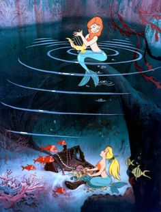 the little mermaid is swimming in an aquarium