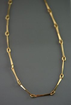 This handcrafted chain is of a big simplicity with these lines and these pure curves, drawn and made carefully to my workshop ; all the rings are welded one by one. The style is subtle and modern and will make a beautiful passkey for a smart holding look or relaxed one. This jewels is made of solid gold, 10 k or 14 k.  A beautiful present for the birthday, Mother's Days, marriage, Christmas or to offer itself to oneself! return to my shop : https://www.etsy.com/ca/shop/stephanielemelin?ref=listing-shop2-all-items-count#items Minimalist Long Yellow Gold Chain Necklace, Minimalist Yellow Gold Long Chain Necklace, Elegant Cable Chain Necklace In Recycled Gold, Minimalist Yellow Gold Oval Link Chain Necklace, Minimalist Yellow Gold Oval Link Necklace, Minimalist 14k Gold Formal Chain Necklace, Minimalist 14k Gold Formal Necklace, Modern Yellow Gold Long Chain Necklace, Modern Long Yellow Gold Chain Necklace