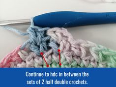 the crochet stitches are marked in red and blue on the left side of the photo