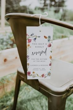 a sign that says, this seat is reserved for the mother of the bride and groom