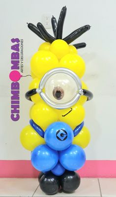 there is a balloon sculpture made to look like a minion