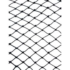 a black and white photo of a chain link fence that has been cut in half