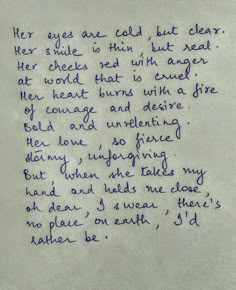 a handwritten poem written in blue ink on white paper