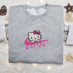 Nike x Hello Kitty Heart Embroidered Hoodie, Valentine Embroidered Sweatshirt, Nike Inspired Embroidered T-shirt (1) Hello Kitty Heart, Nike Inspired, Hello Kitty Hoodie, Pokemon Shirts, Sweatshirt Nike, Kitty Clothes, Maroon Hoodie, Hello Kitty Clothes, Embroidered Shirts