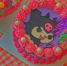 a birthday cake decorated with an image of a cat