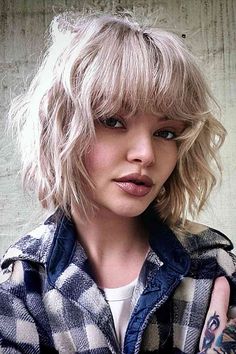 Textured and Tousled Platinum Bob with Bangs for girls with a messy style Platinum Bob, Messy Bob Haircut, Bangs Ideas