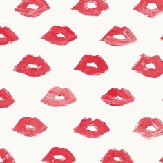 lipstick kisses drawn on white paper with red and pink paint strokes in the middle,