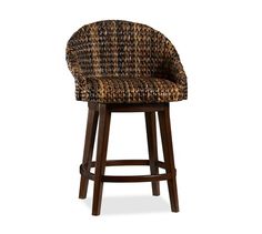 an upholstered bar stool with a brown and black pattern on the backrest