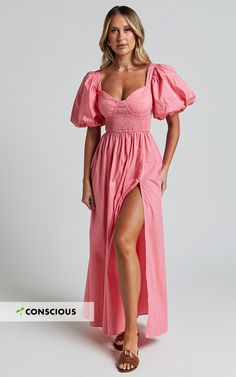 Get ready to turn heads in our Raiza Midi Dress! This stunning Coral Pink dress is perfect for any occasion, from parties to weddings. The shirred waist and puff sleeves add a touch of femininity, while the sweetheart neckline adds a hint of romance. Made from high-quality polyester, this dress will keep you comfortable all day long. Whether you're looking for a sweet and chic day dress or an elegant wedding guest outfit, the Raiza Midi Dress has got you covered. Don't miss out on this must-have Elegant Wedding Guest Outfit, Coral Gown, Coral Pink Dress, Disneyland Outfits, Hacks Clothes, Puff Sleeve Dress, Fashion Hacks, Fashion Hacks Clothes, Puffed Sleeves Dress