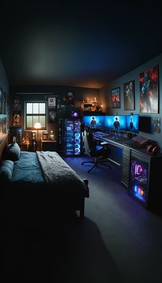 a bedroom with a bed, desk and computer equipment in it at night time is lit up by colorful lights