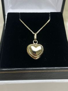 Enhance your jewelry collection with this lovely Italian Heart necklace, crafted by Simonian® Jewelry. The 14K yellow gold necklace is 28 inches long and features a hollow Heart Pendant.  The pendant is made of Solid 14K Gold and comes with a Certificate Guarantee. The necklace is perfect for anyone who loves fine jewelry and wants to add a touch of elegance to their look. The charm does not have any stones, making it a versatile piece that can be worn with any outfit.  This necklace is a must-h Heirloom Yellow Gold Heart Pendant Necklace, Gold-tone Heart Pendant Necklace With Tarnish Resistance, Yellow Gold Tarnish-resistant Heart Pendant Necklace, Antique Heart Pendant In Yellow Gold, 14k Gold Heart Pendant Necklace, Brilliant Cut, Hollow Heart, 14k Yellow Gold Necklace, Heart Necklace, Heart Pendant