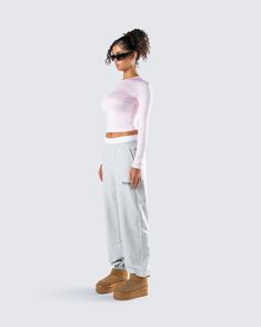 Even on your off days, you’ll look better than everyone in this two-piece set 💗 Perfect for your casual days, this fit features a pink jersey long sleeve top paired with grey sweatpants, for a look that blends cute and cozy in the best way possible 😚 Trendy Pink Sweatpants For Lounging, Pink Athleisure Sweatpants For Lounging, Sporty Pink Sweatpants With Ribbed Cuffs, Pink Athleisure Sweatpants With Ribbed Cuffs, Pink Athleisure Sweats For Loungewear, Pink Sweatpants For Fall Loungewear, Fall Pink Sweatpants For Loungewear, Pink Athleisure Activewear For Lounging, Pink Casual Sweats For Loungewear