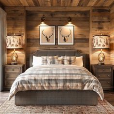 a bedroom with wood paneling and two lamps