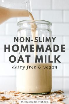 no - slimy homemade oat milk is being poured into a glass jar