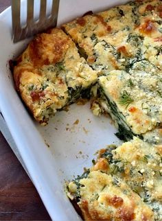 a casserole dish with broccoli and cheese on it, ready to be eaten